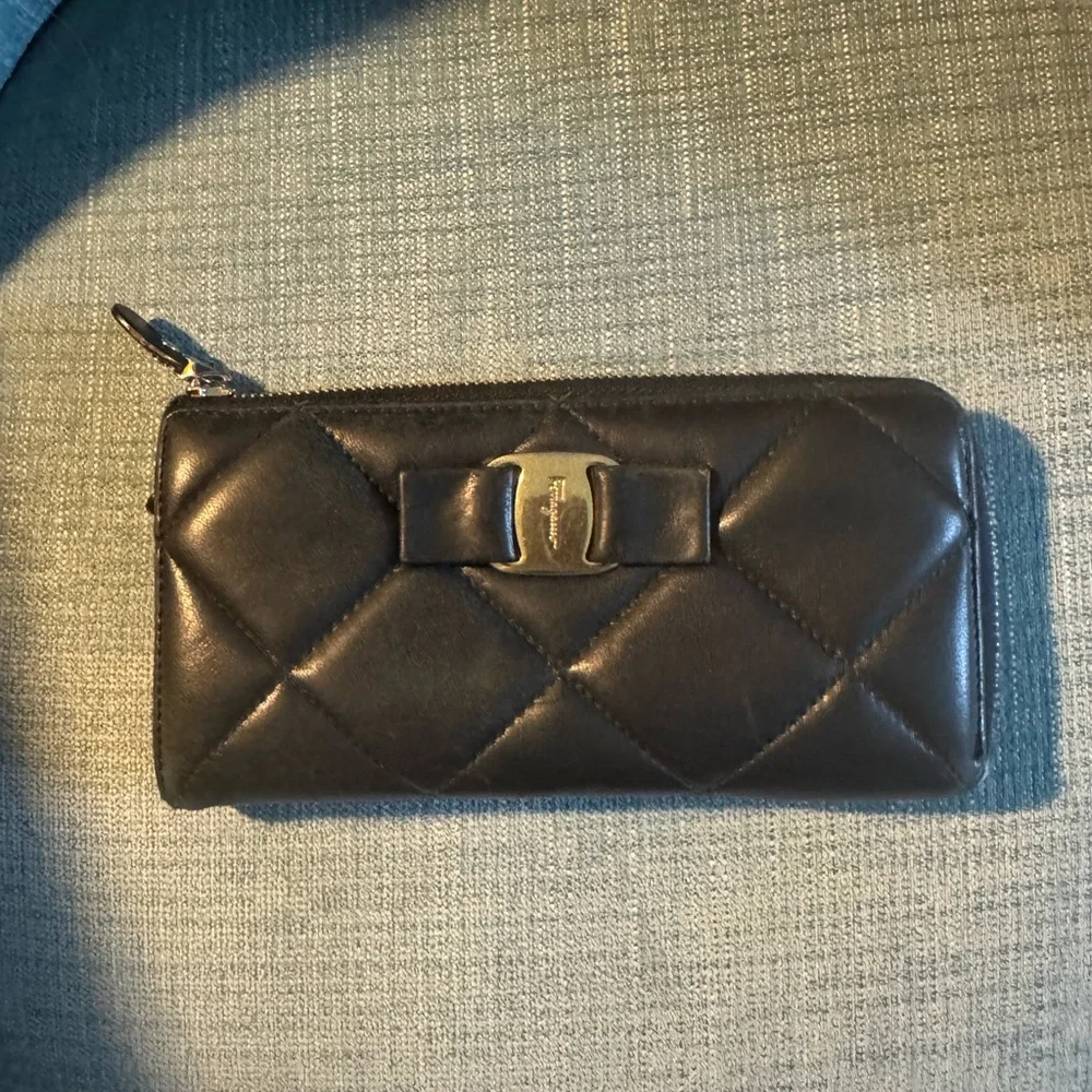 Salvatore Ferragamo Black Quilted Vara Zip Around Wallet with Gold Hardware. - Picture 2 of 9